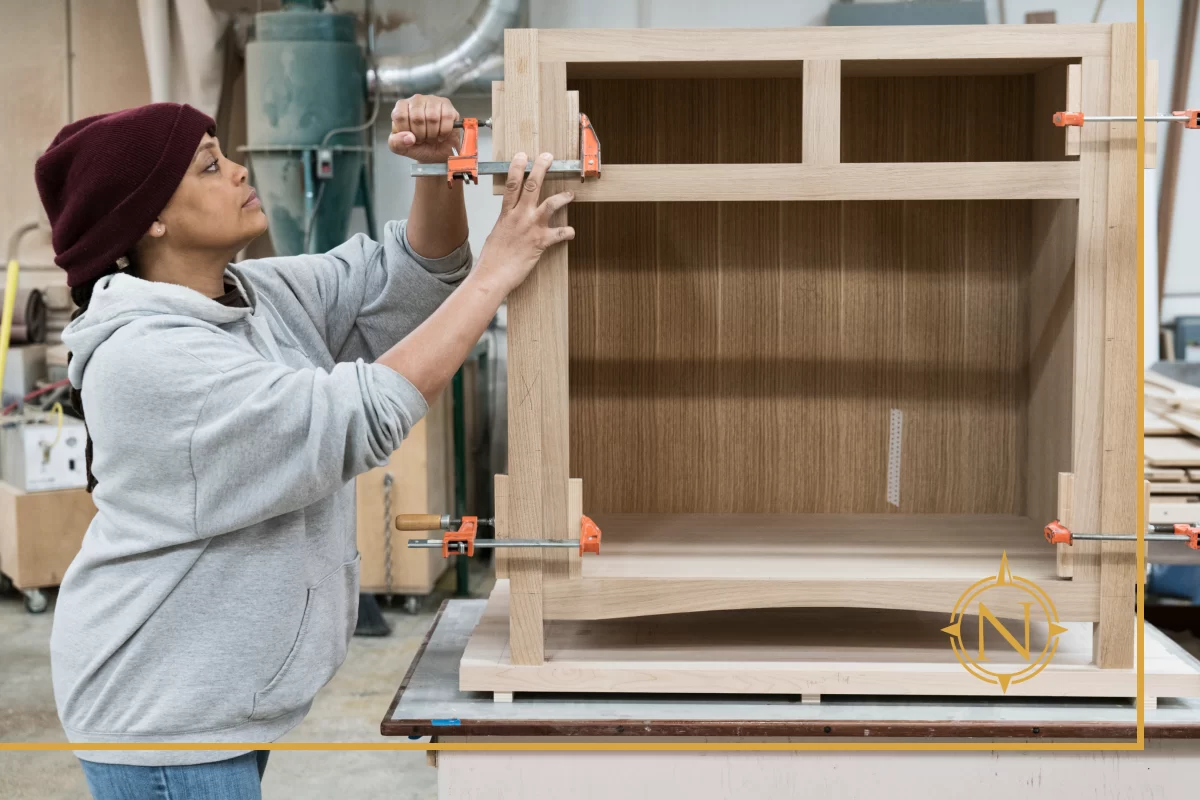 Close-up view of high-quality custom kitchen cabinet construction and drawer hardware