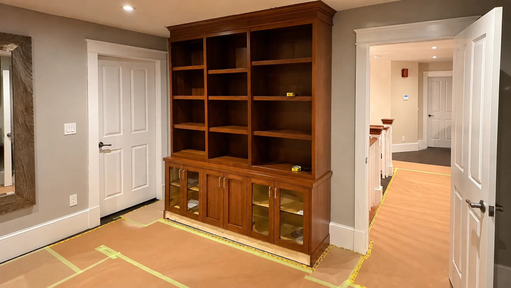 Wood built-in cabinetry before professional refinishing by True North Cabinetry in Edmonton.
